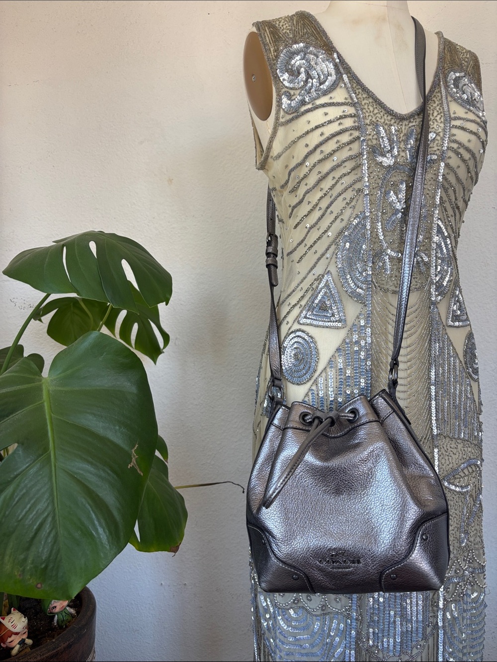 Coach Metallic Silver Pebbled Leather Drawstring Crossbody Bag